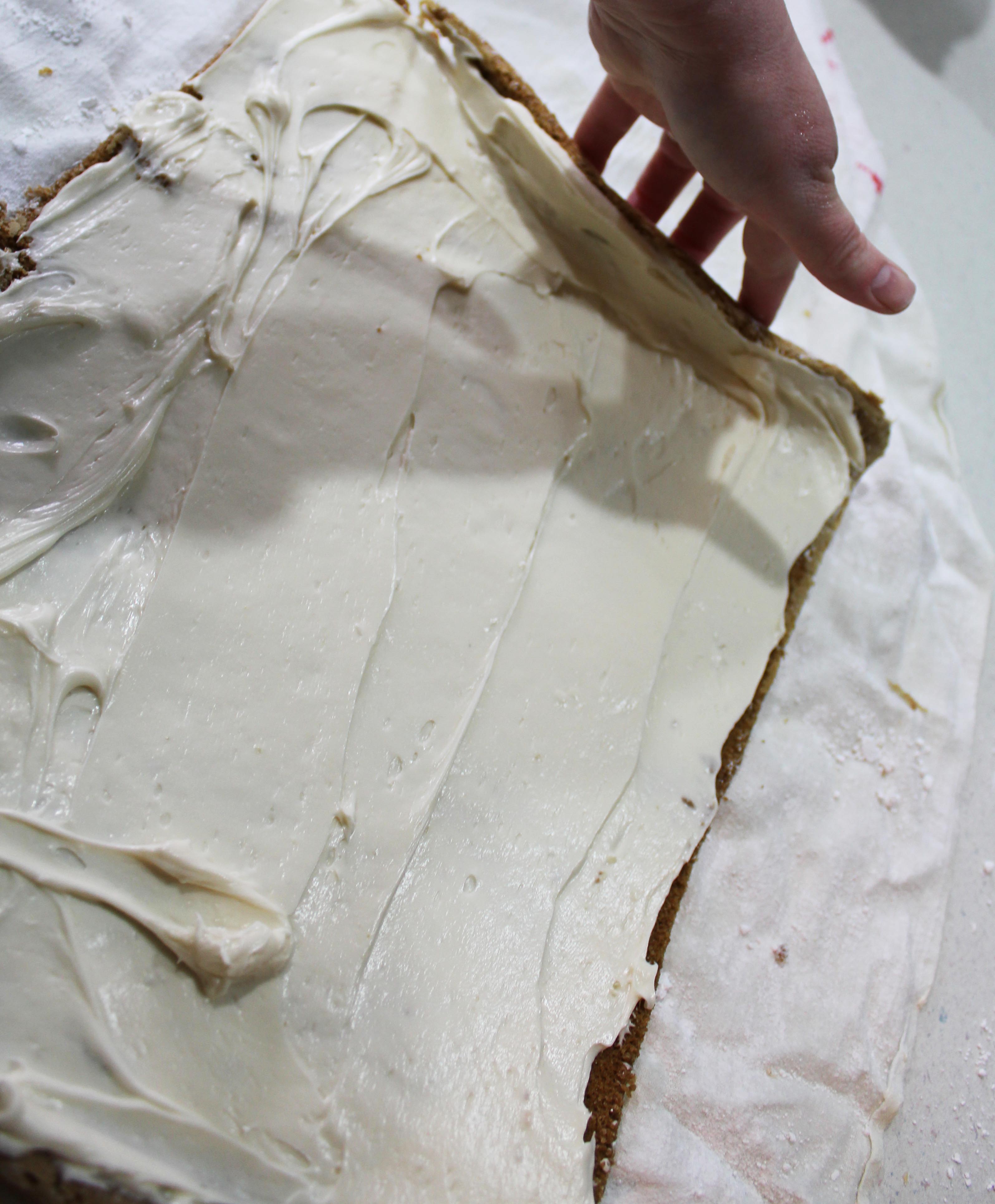 Pumpkin roll rolling up