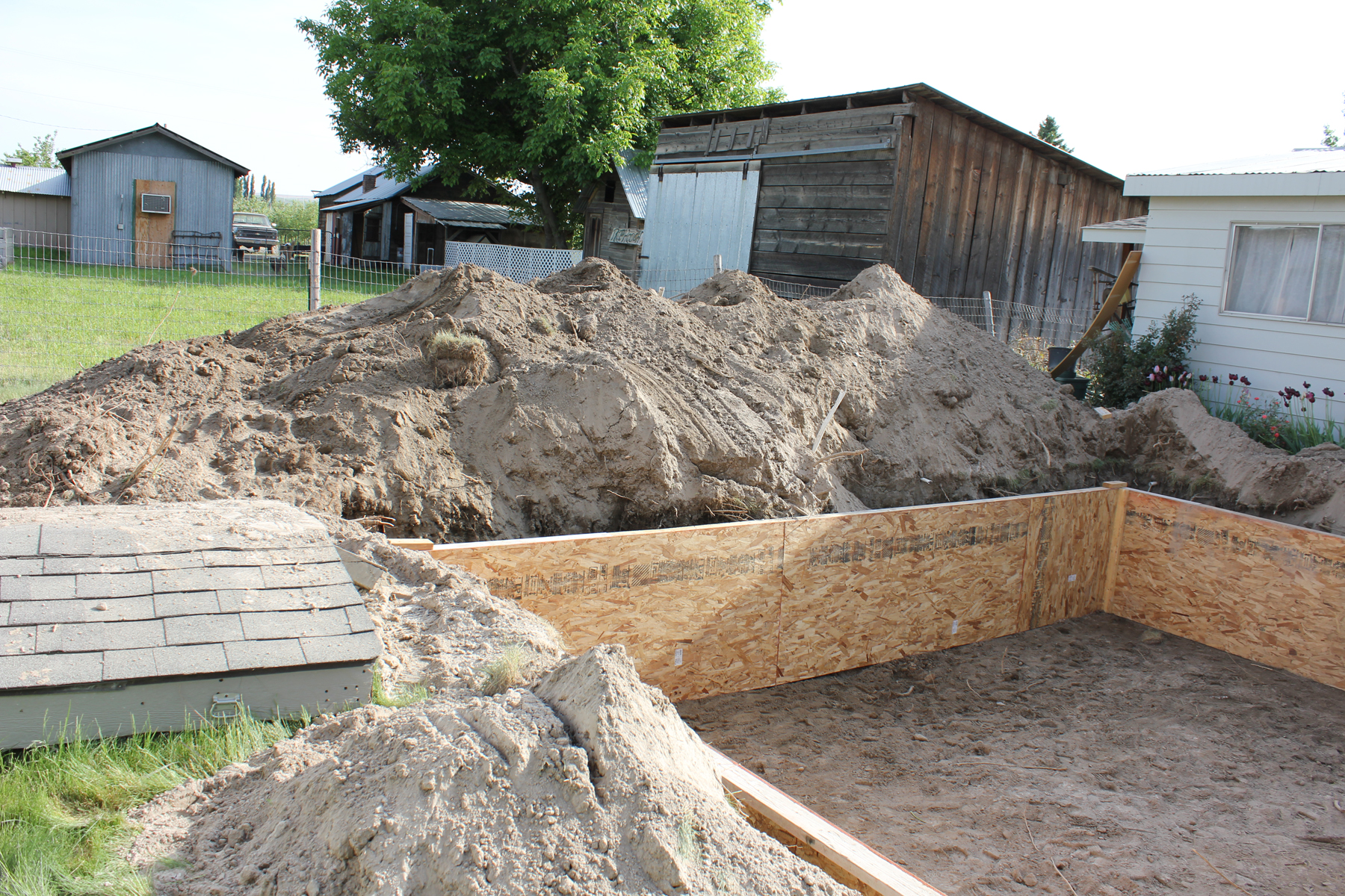 septic pool piles of dirt