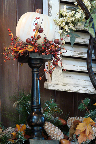 white pumpkin on pedestal