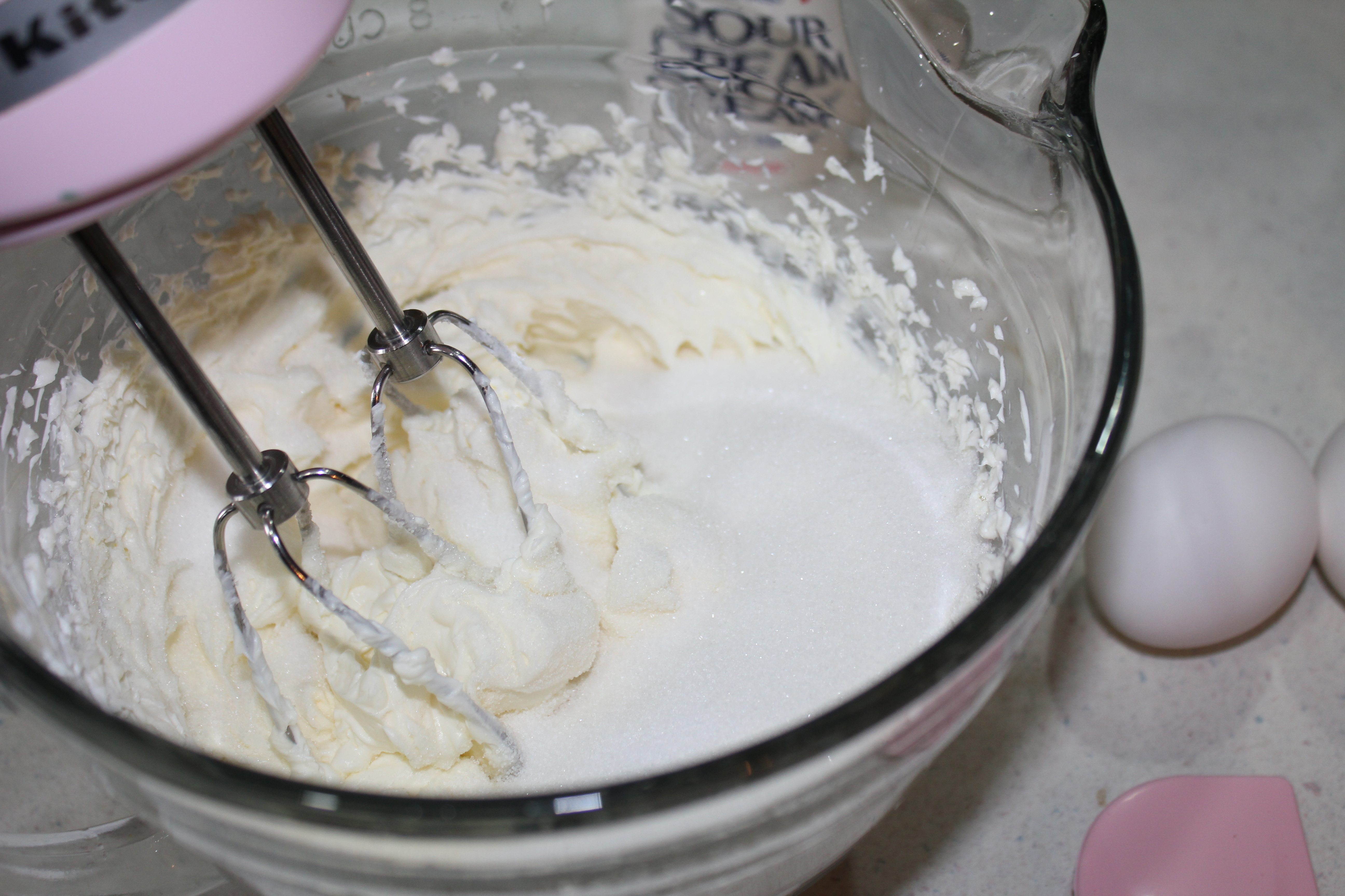 Add sugar and salt, blending well.
