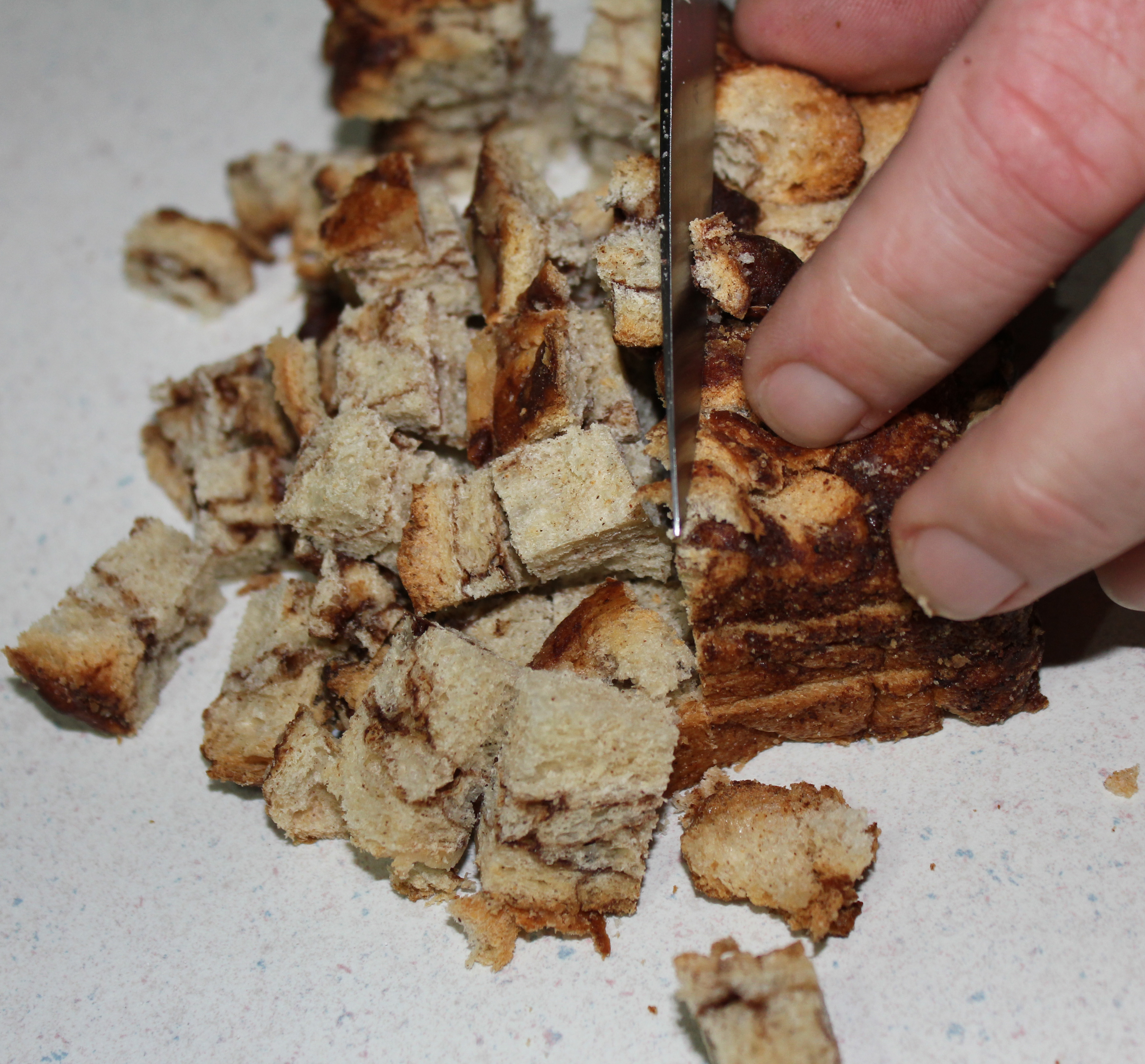 Make your husband cube the bread while you beat the egg mixture.
