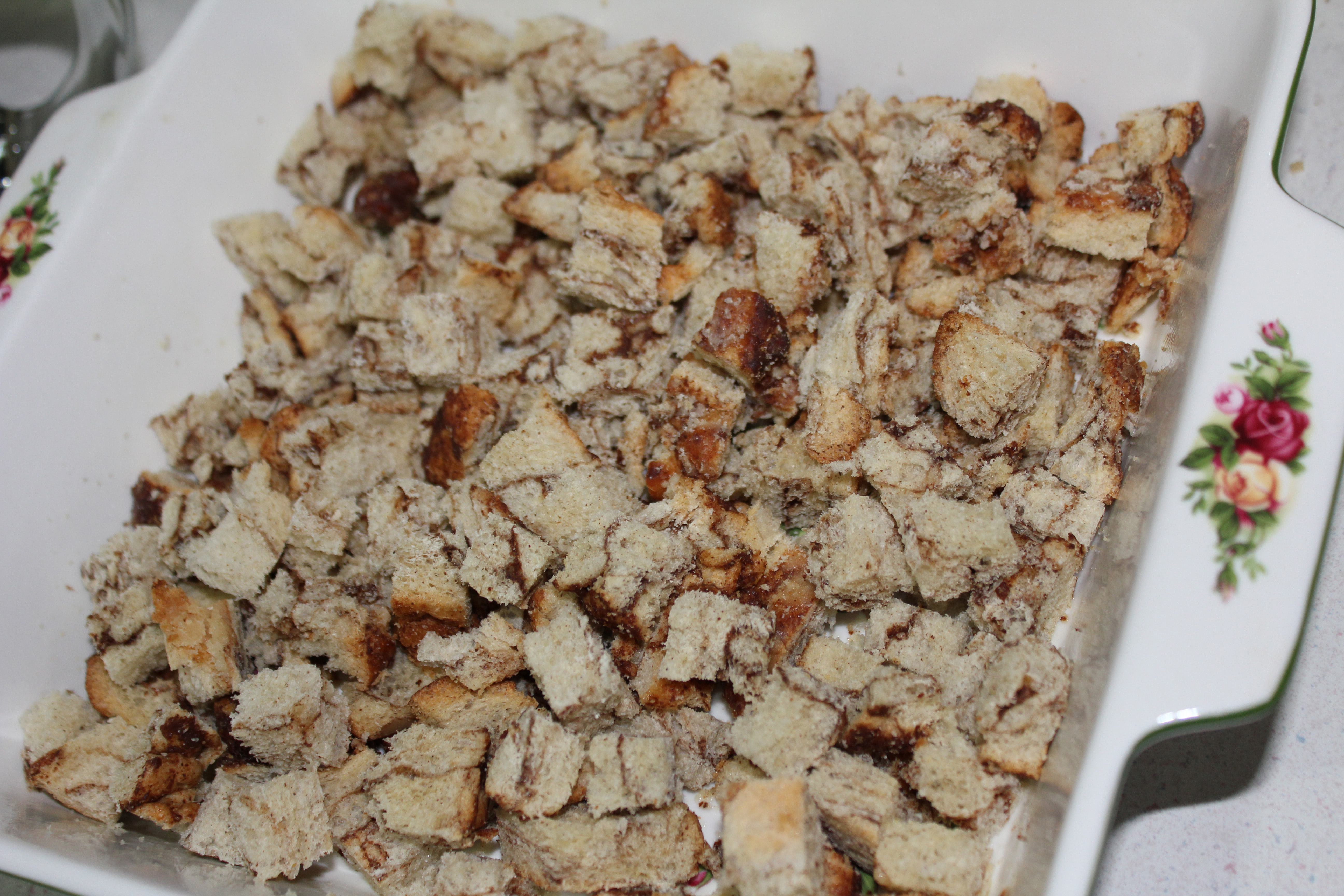 Spread the cubes evenly into a greased baking pan.