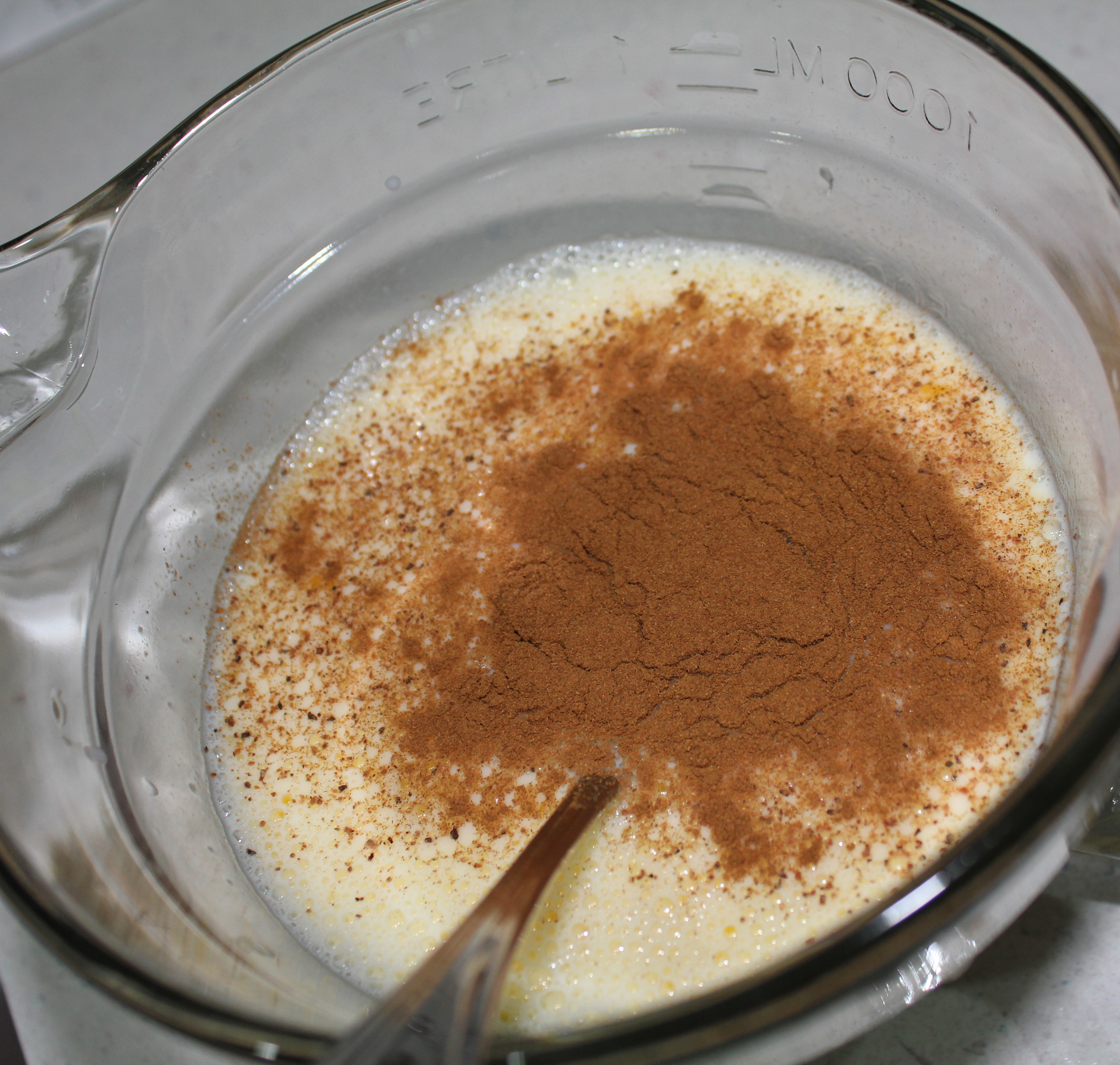 Mix egg, milk and spices until well blended.