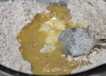 Add in butter and baking soda until well combined.